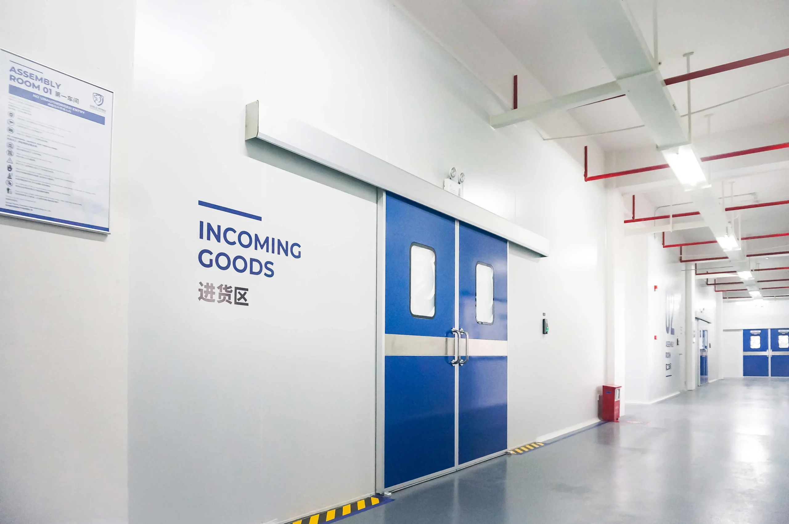 Incoming goods area and sliding cleanroom doors at the Shield Works facility, Zhuhai