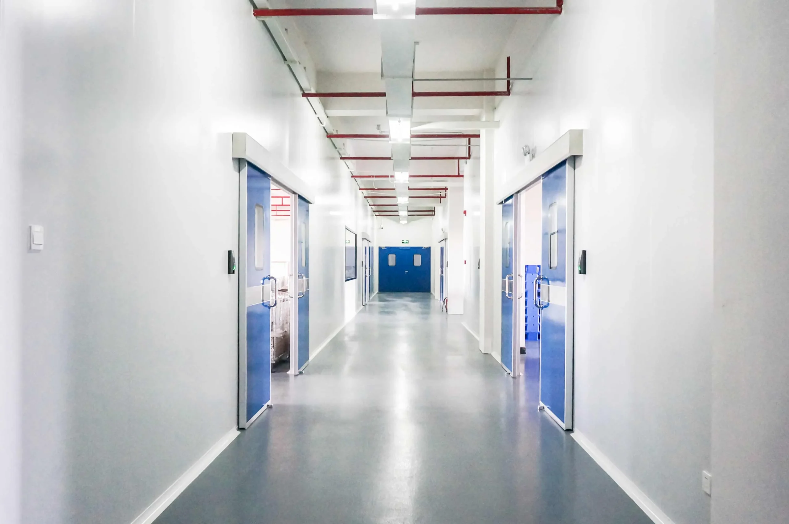 Corridor of access-controlled production rooms at the Shield Works facility in Zhuhai