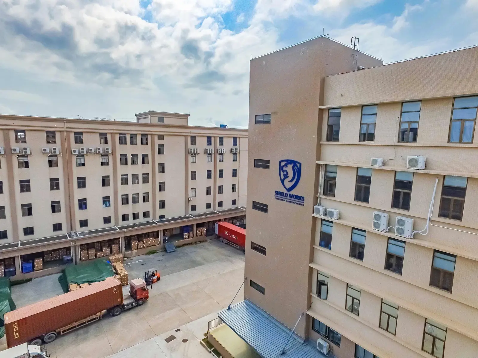 Shield Works Zhuhai facility, loading bay with shipping containers