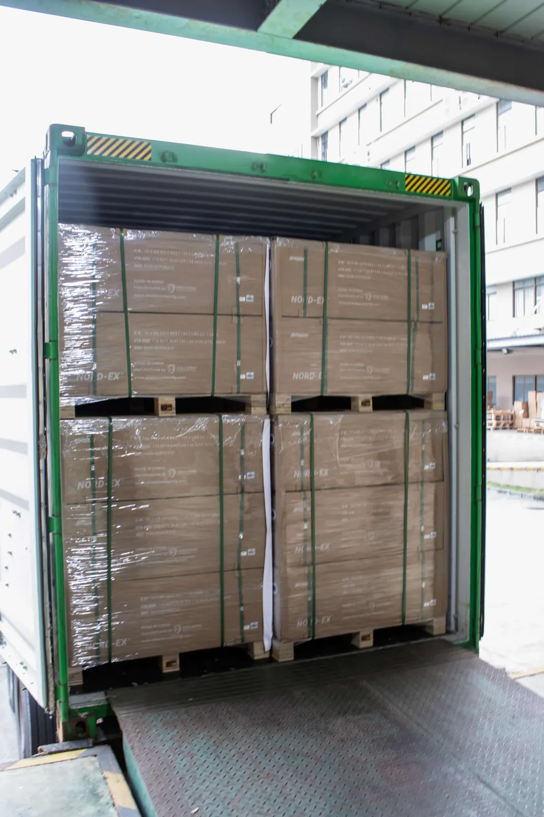 A fully loaded container of palletised cartons before the doors close