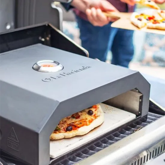 La Hacienda pizza oven on a gas grill