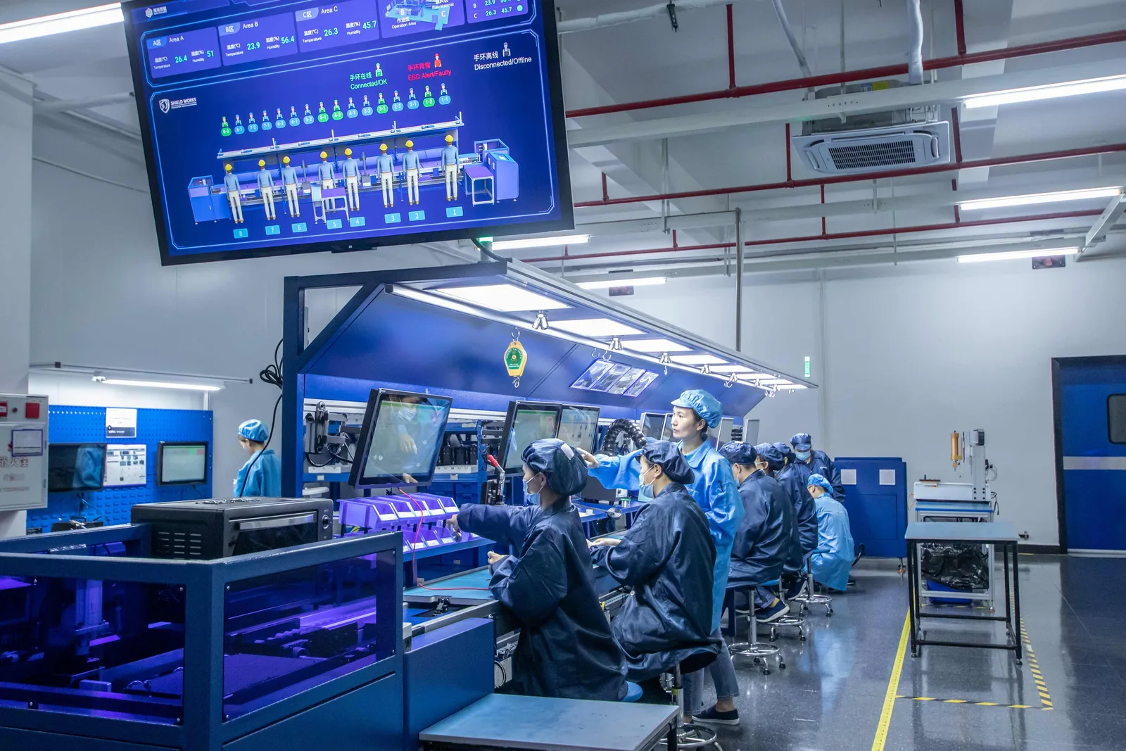 The ESD-controlled electronics line at Shield Works with the monitoring board overhead