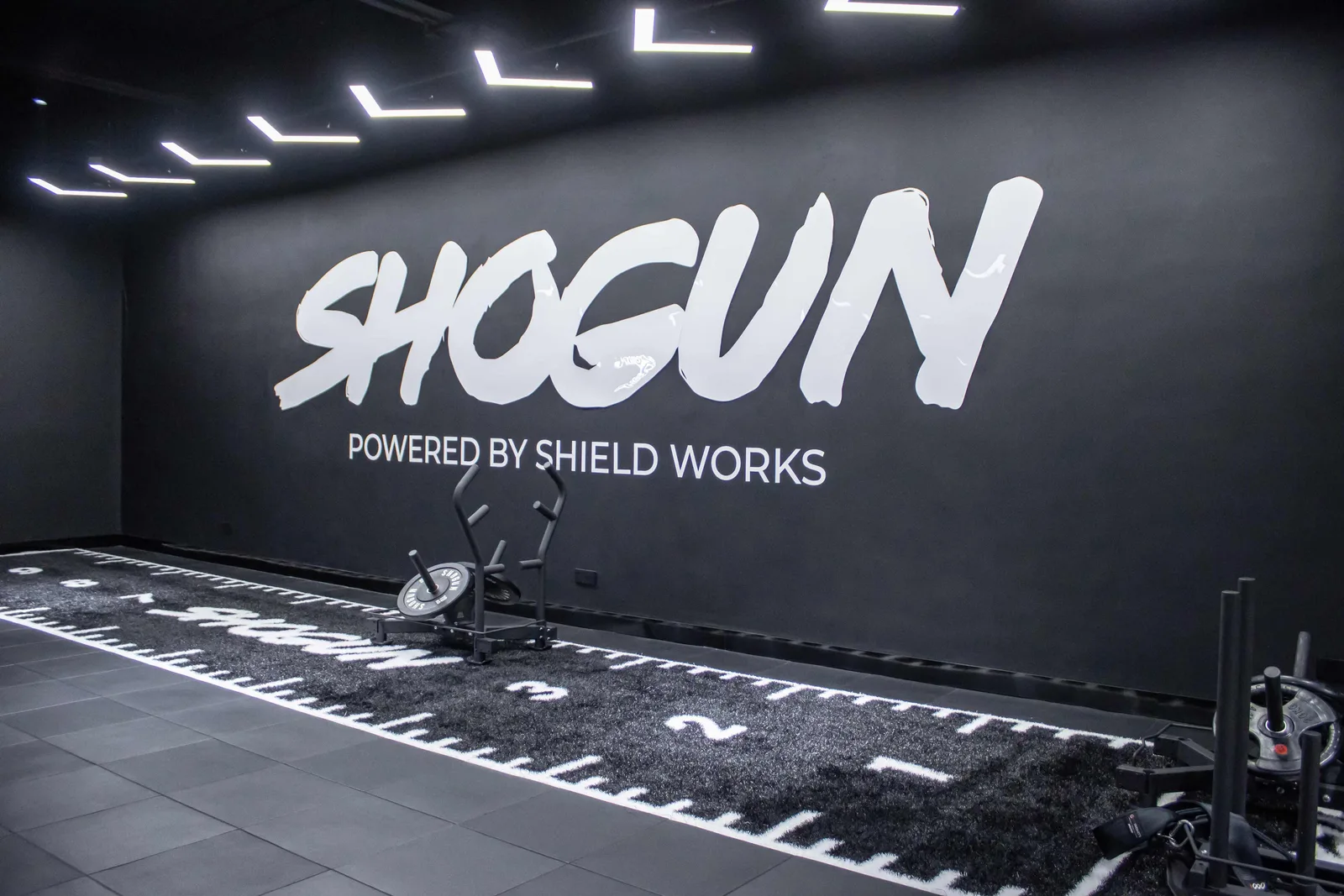 Turf training area with Shogun Sports equipment in the Shield Works on-site gym