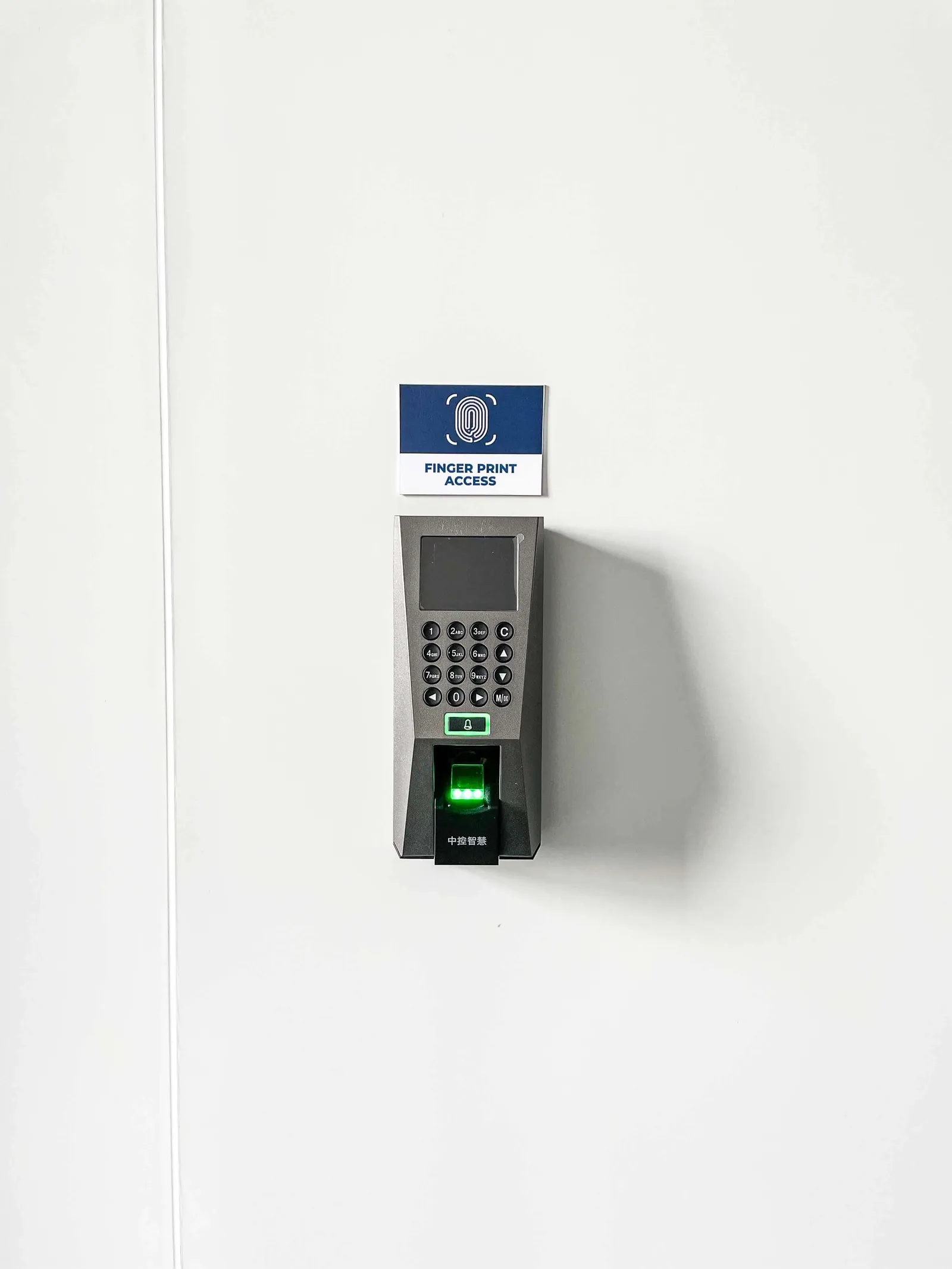 Fingerprint access reader controlling entry to a Shield Works IP-protected zone