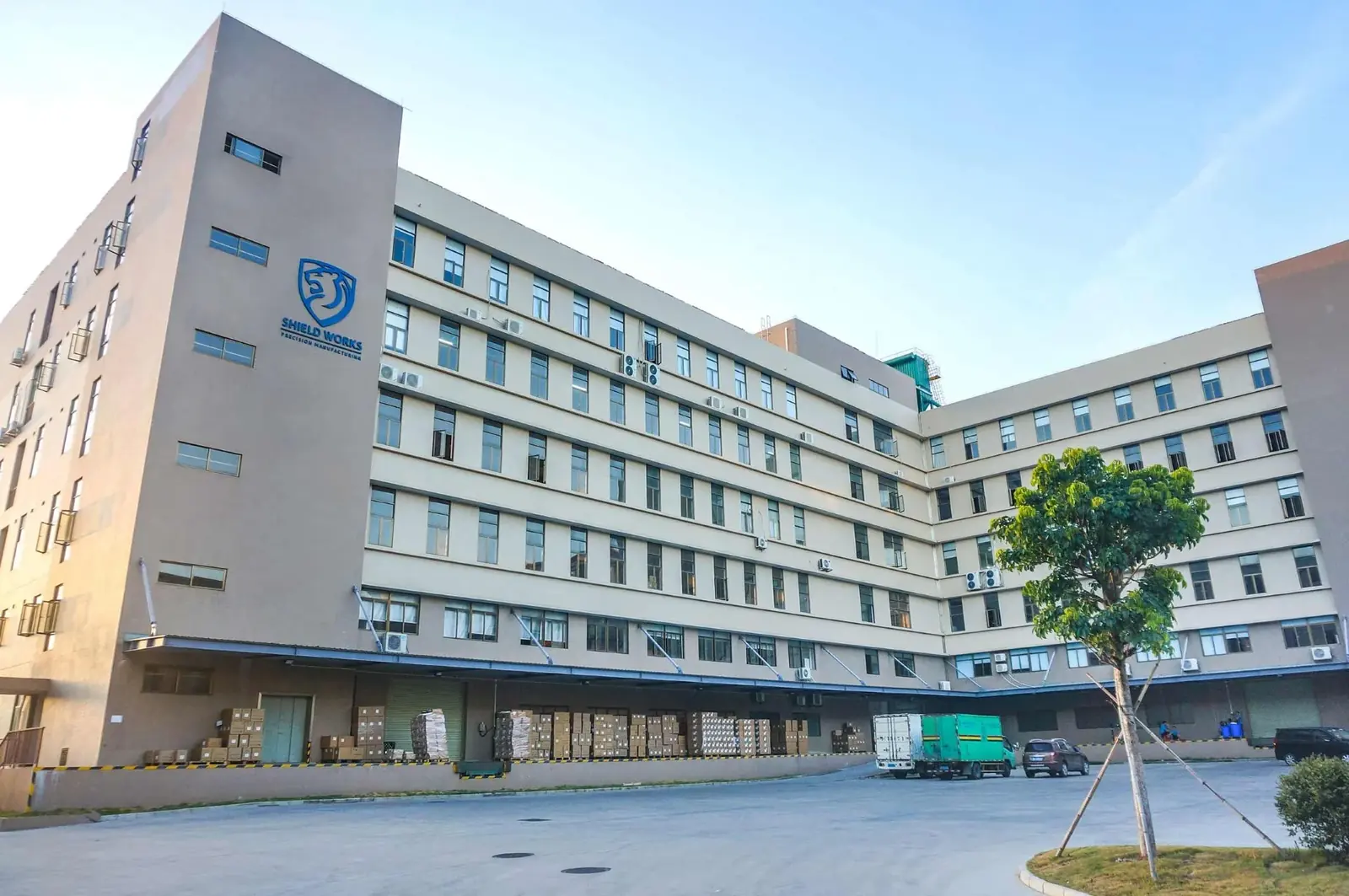 Shield Works Zhuhai facility, ground-level building exterior with branded entrance